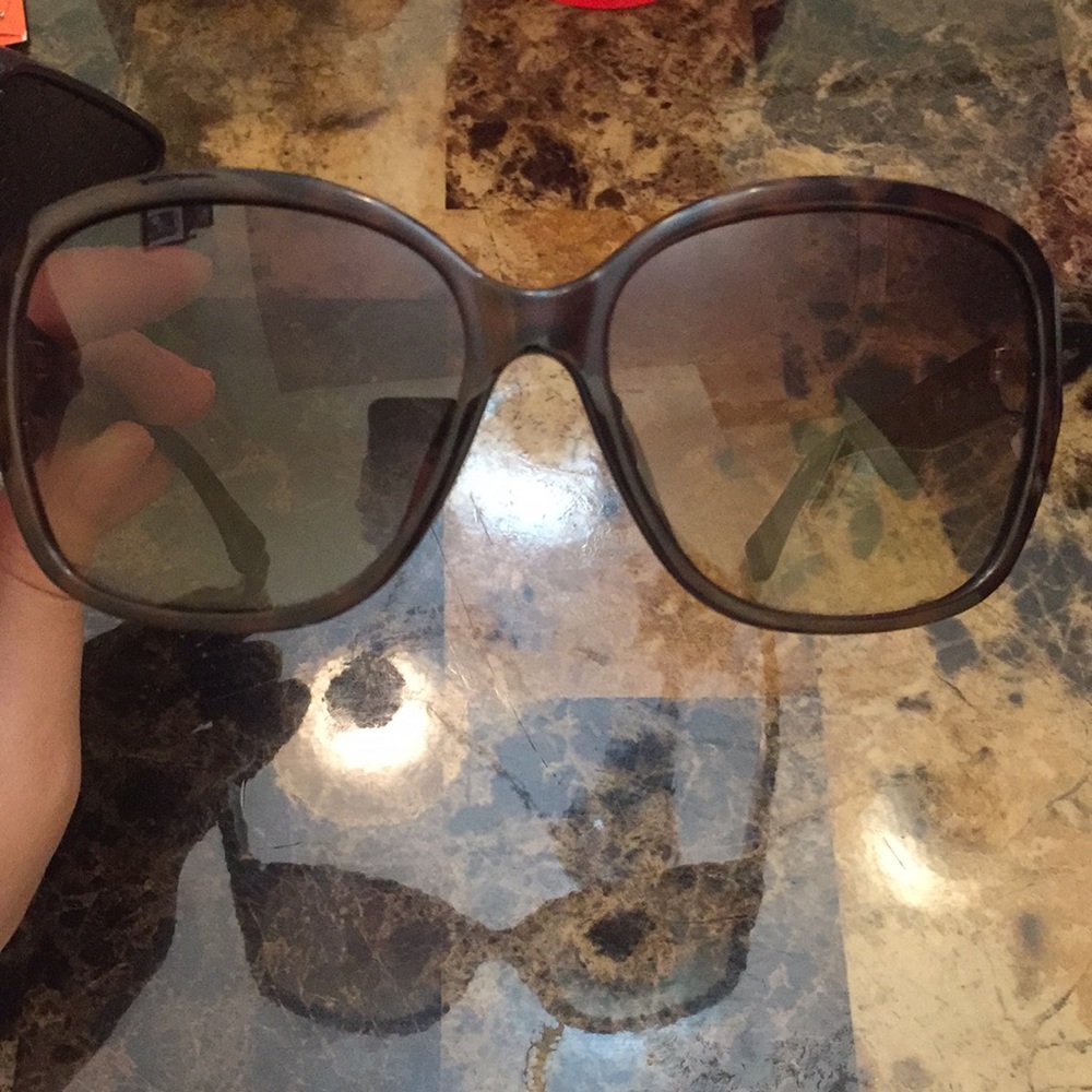 Michael Kors Sunglasses .